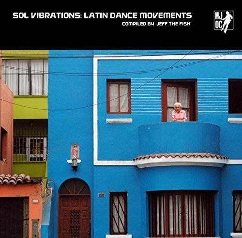 Vinyl record album cover featuring a woman on a balcony of a blue building.