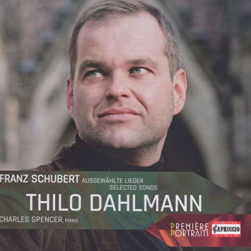 A man with short hair and brown jacket on a classical music CD cover.