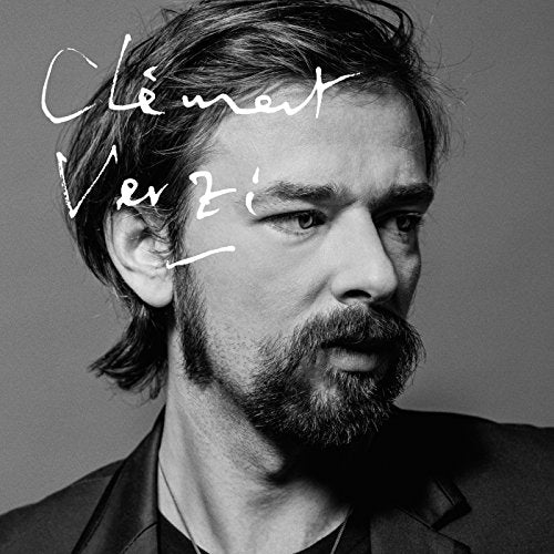 Black and white portrait of Clement Verzi, a man with beard and hair.