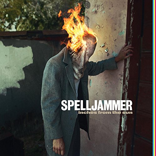 Album cover: person with head aflame leaning against a wall.
