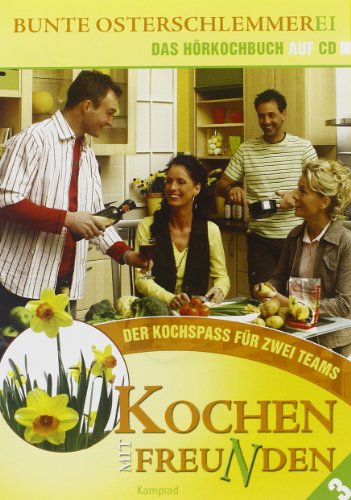 "Four people cooking together in a kitchen, with food on the table."