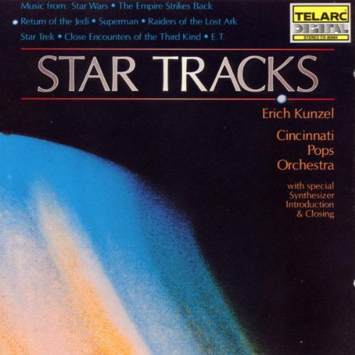 "CD cover with 'Star Tracks' title, planet image, and artist names on a black background."