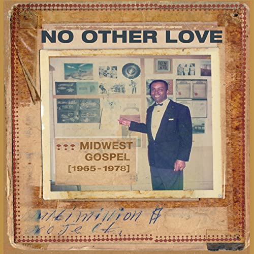 Vinyl record cover featuring a man in a suit pointing to a display.