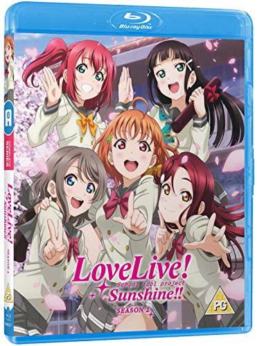 Blu-ray cover featuring five smiling anime girls amidst falling petals.