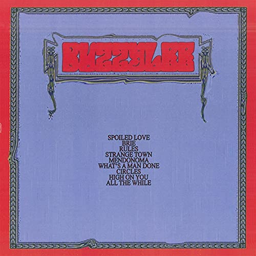 “Spoiled Love” vinyl record cover with red and blue patterned design.