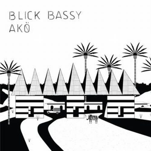 Black and white vinyl album cover with stylized African village and palm trees illustration.