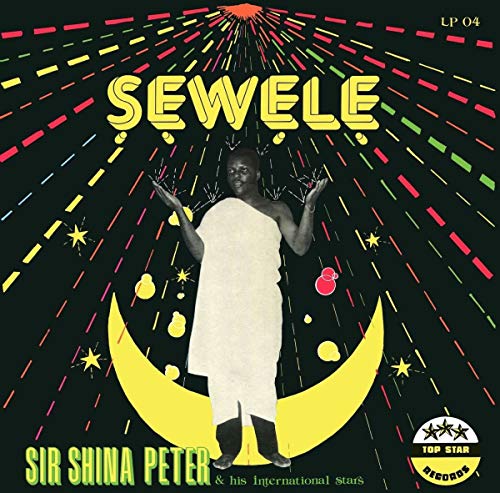 Vinyl album cover with a man standing on a yellow crescent moon.