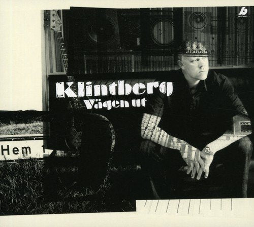 Black and white CD cover featuring a man with a guitar and piano keys.