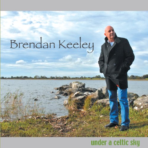 "Album cover featuring a man standing by a lake, wearing a black coat."