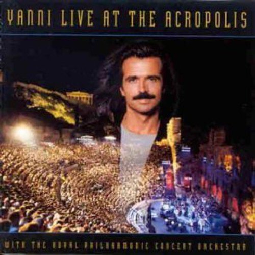 "CD cover of Yanni Live at the Acropolis with a man and crowd."