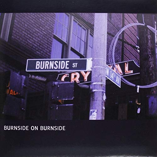 Street sign reading "Burnside St" on a vinyl record album cover.