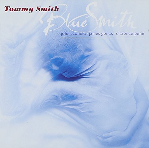 "Album cover with blue-toned image and text 'Tommy Smith Blue Smith' in red and white."