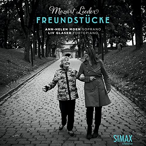 CD cover featuring two women walking on a brick path.