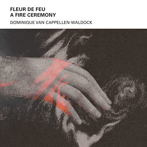 CD cover: hand with red markings against a dark, textured background.