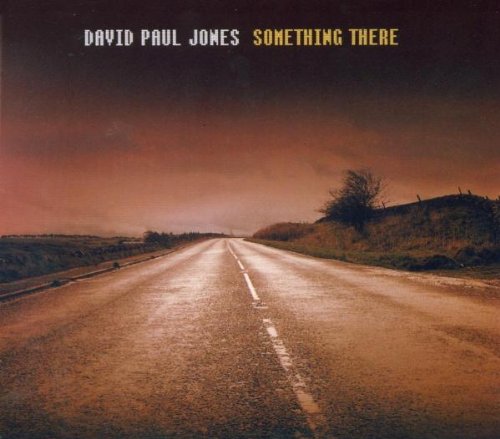 "Album cover with a deserted road under a dark red sky."