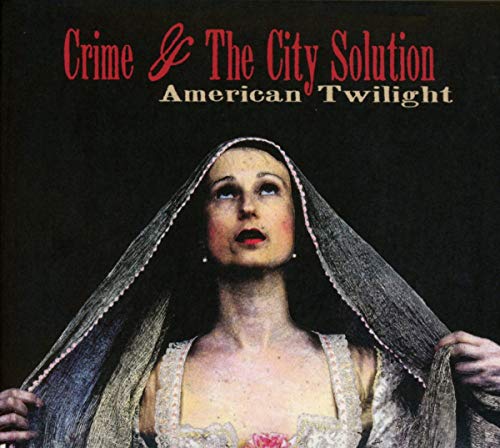 CD cover: Woman in veil, red text “Crime & The City Solution”.