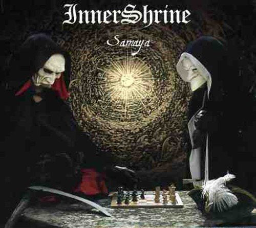 "Album cover featuring two masked figures playing chess in a dark, ornate setting."