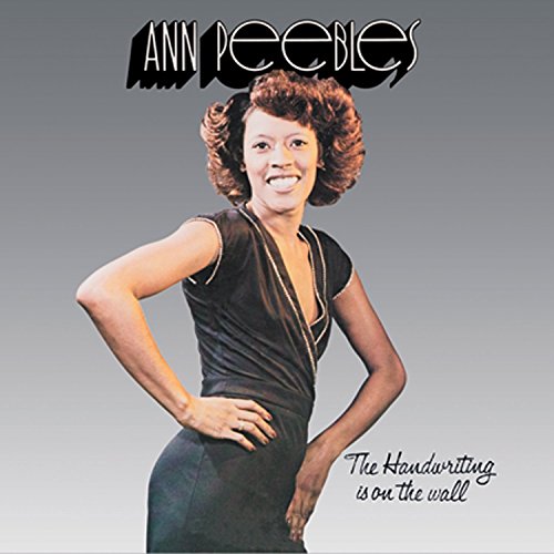 Ann Peebles album cover featuring a smiling woman in a black dress, grey gradient background.