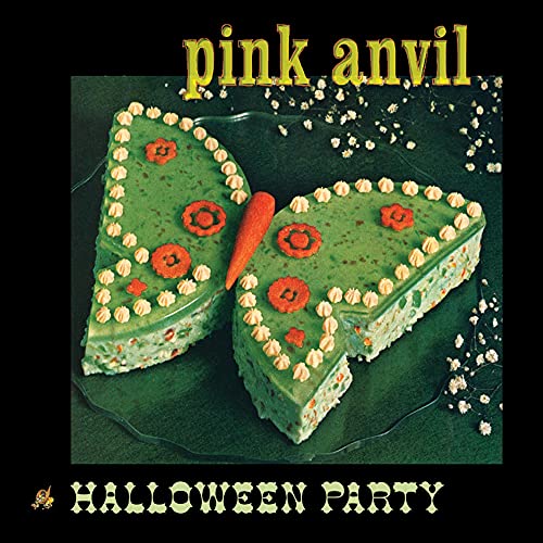 CD cover: butterfly-shaped cake with green frosting and red decorations.