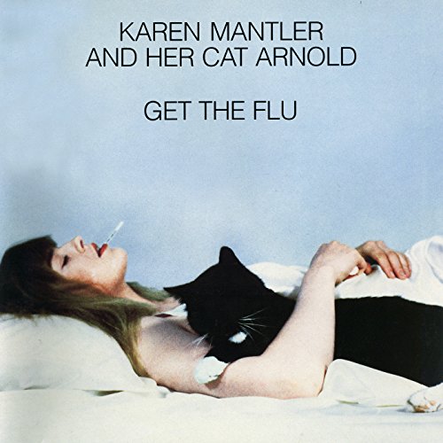 Vinyl album cover featuring a woman lying down with a cat.