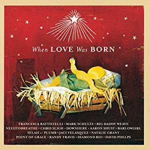 CD cover: Nativity scene with baby Jesus in a manger, red background.