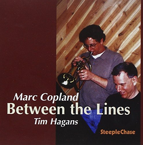 CD cover featuring a jazz musician playing the trumpet with another man.