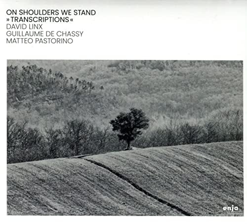 CD cover: grayscale landscape with a lone tree, album title visible.