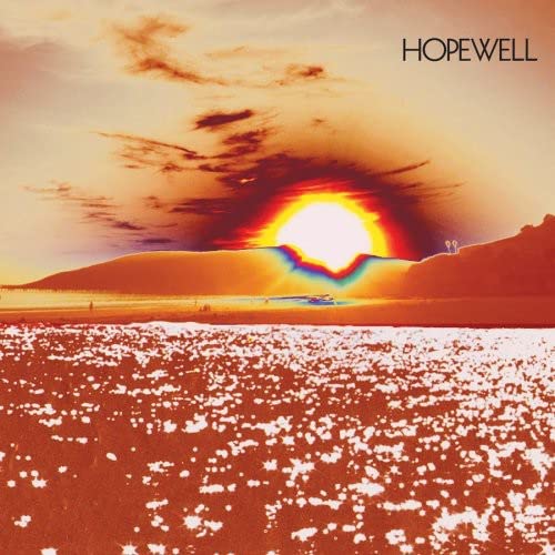 Album cover for Hopewell’s “Good Good Desperation” with a sunset landscape.