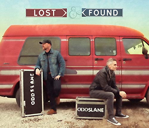 "Album cover with two men beside a red van, 'Lost & Found' title above."