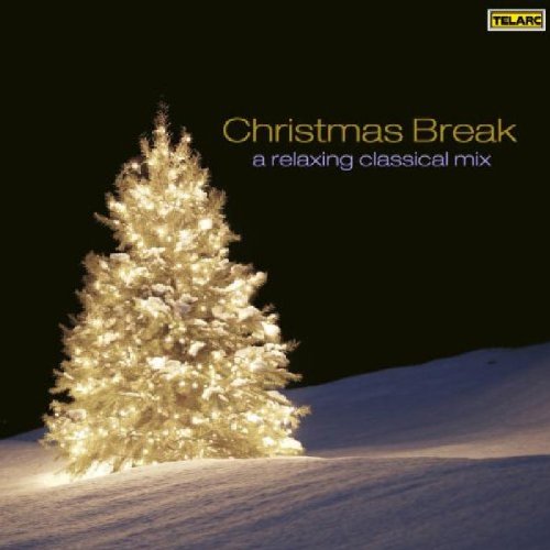 "CD cover with a lit Christmas tree in the snow against a black background."
