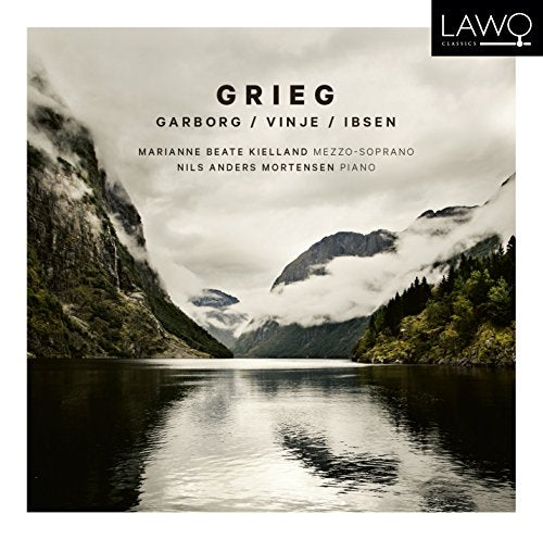 CD cover featuring a serene lake surrounded by mountains and foggy atmosphere.