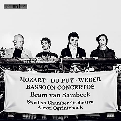 CD cover with black and white portrait of four men and text banner.