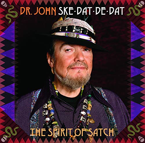 Vinyl album cover featuring Dr. John with decorative hat and jewelry against a patterned background.