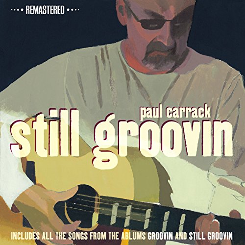 Paul Carrack album cover: painted portrait with guitar, titled “Still Groovin”.