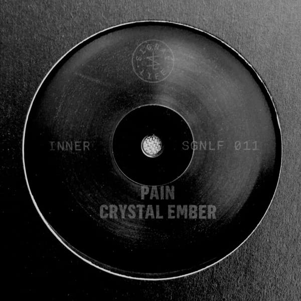 Black vinyl record label with white text: “Inner”, “Pain”, “Crystal Ember”.