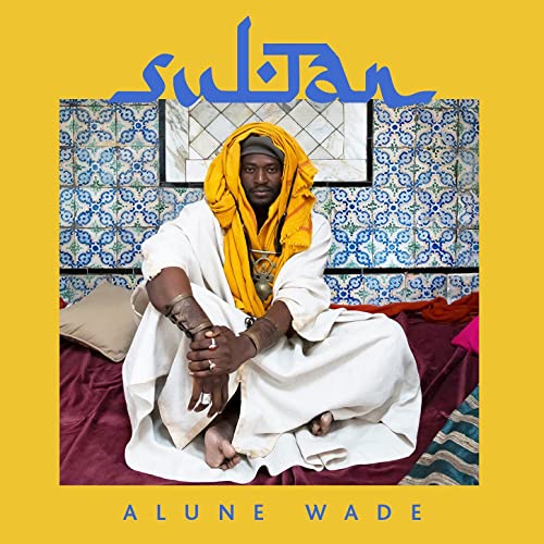 Alune Wade "Sultan" CD cover: man in white robes with yellow headwrap.