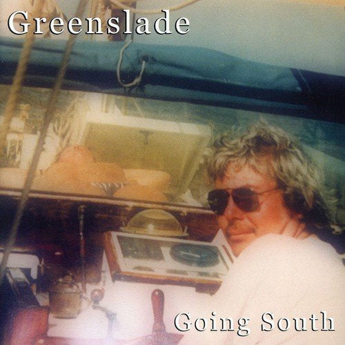 Greenslade album cover featuring a man with sunglasses on a boat.