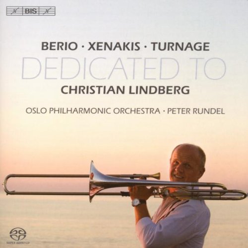 A man holding a trombone against a pale sunset background, on a CD cover.