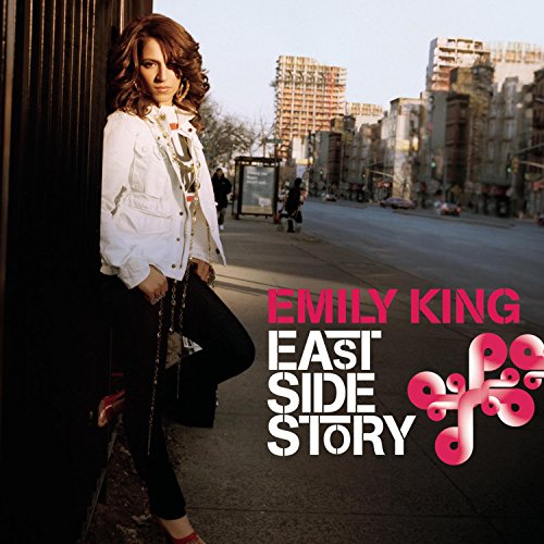 Emily King album cover, woman in white jacket against city backdrop.