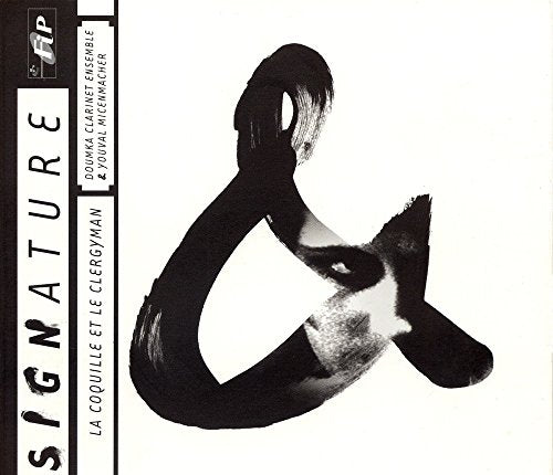 CD cover: abstract black and white image of a shell and face.
