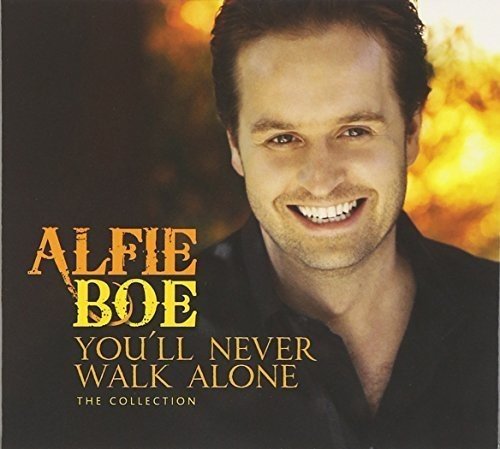 Alfie Boe's album cover featuring a smiling man in a black shirt.