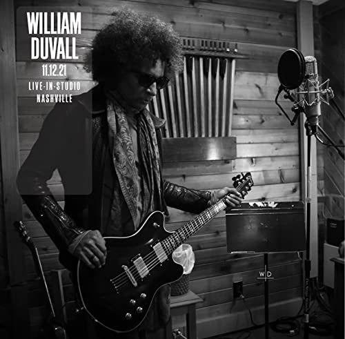 Black and white album cover featuring William Duvall with a guitar.