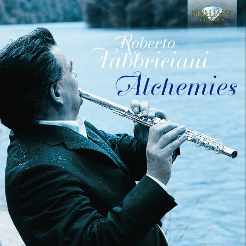 "CD cover featuring a man playing flute by a body of water."