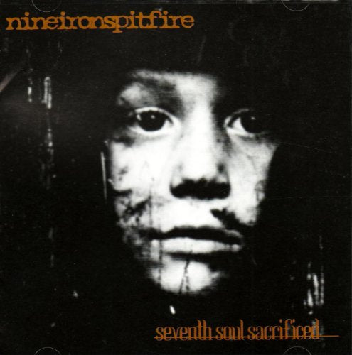 CD cover: distressed portrait of a child with intense gaze.