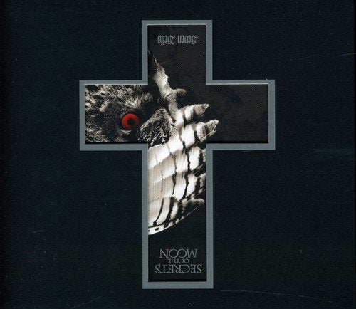 CD cover: dark cross with owl and text “Secrets Of The Moon”.