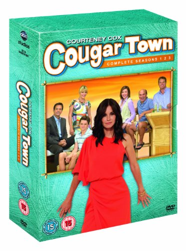 DVD cover for "Cougar Town" featuring a woman in red and a cast photo.