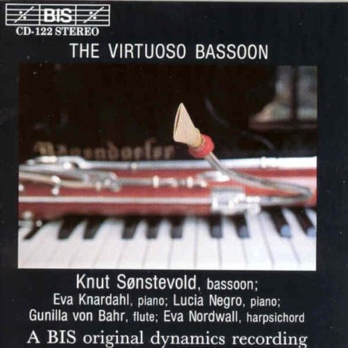 CD cover featuring a bassoon over piano keys, black background.