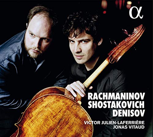 "CD cover featuring two men, one holding a cello, against a dark background."