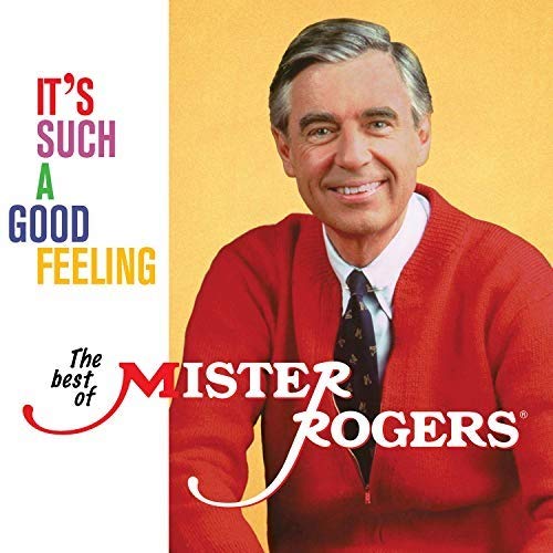 "Mister Rogers smiling in a red sweater, with colorful text on a white and yellow background."