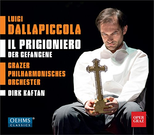 Man holding a crucifix, seated, on a classical music CD cover with text.